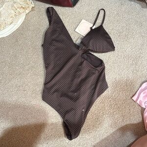 Kittenish one piece swimsuit